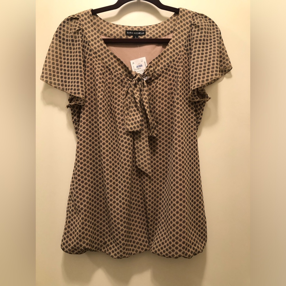 SARA MICHELLE- Ruffled sleeve blouse.